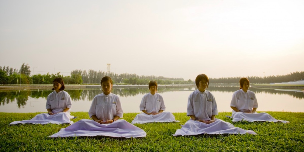 group of people in meditation