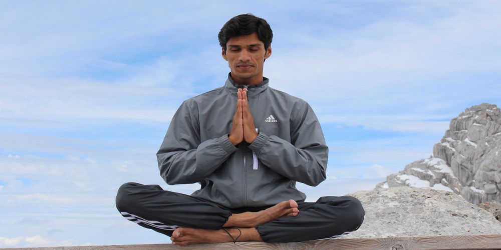 man meditatng what is hatha yoga