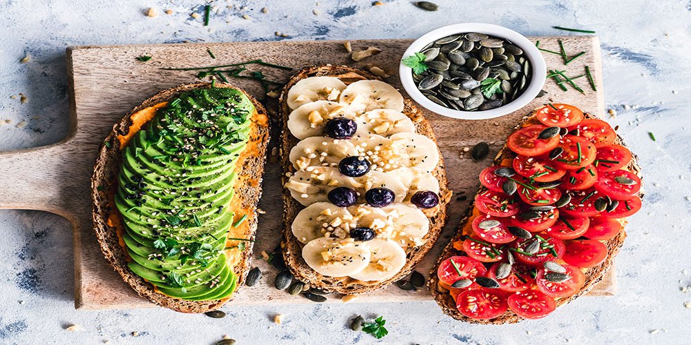 bread with plant-based toppings eat vegan during summer